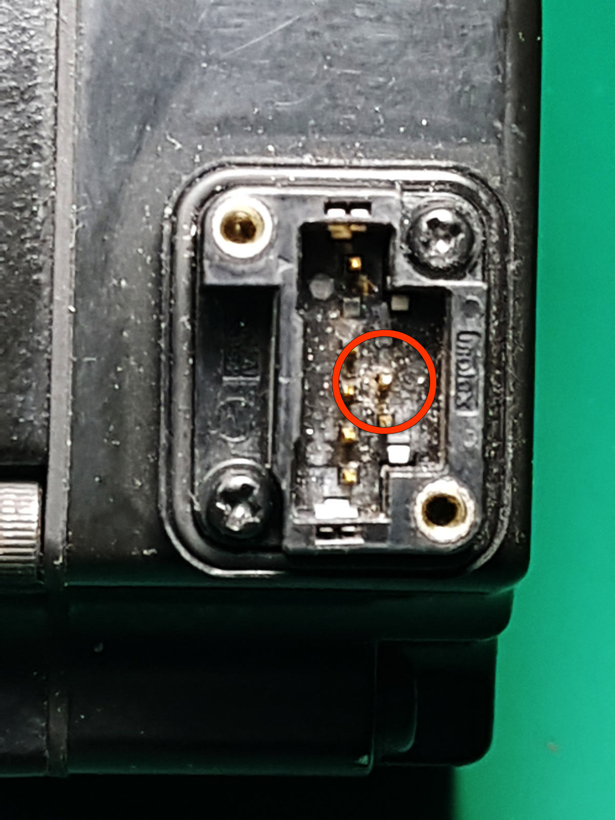 The encoder pin, now straightened and aligned with the other pins, ready for a connector.