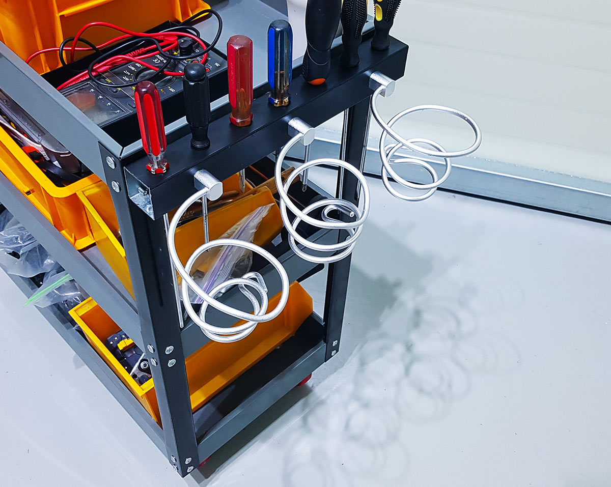 The installed bracket with bent wires ready for tools.